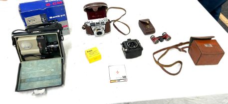 Selection of vintage cameras and items to include Sankyo 8-cm micro zoom, Baby Brownie, Kodak, all