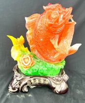 Resin oriental fish figure measures approximately 15 inches tall