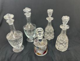 Selection of glass decanters with stoppers, to include a pairs of etched