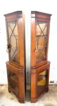 Pair of mahogany glass fronted corner cabinets with keys measures approx 71 inches tall by 26 inches