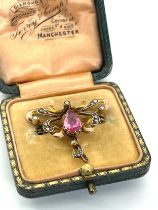 9ct gold Victorian brooch in original fitted case, set with seed pearls and an untested pink
