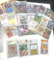 selection of 4 graded Pokemon cards includes Simisear V star 9 mint, copperajah, Jolteon 7 near