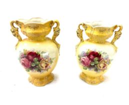 Pair of vases measures approximately 10 inches tall