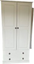 Two door two drawer painted pine wardrobe measures approx 78 inches tall by 36 inches wide and 21.