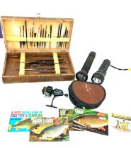 Selection of vintage fishing equipment to include floats, reels etc