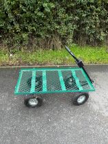 Small metal pull along trolley, approximate measurements: Length 37.5 inches, Width 20 inches,