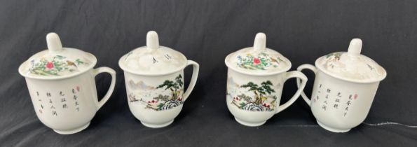 Large selection of lidded oriental tea cups, approximately 22 in total