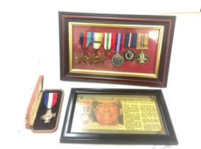 Framed world war II medals to James Pole with a framed news paper artical