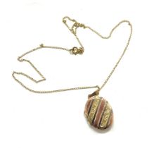 Ladies 9ct gold locket and chain total weight 3.6grams