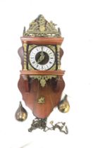 Dutch wall hanging clock with weights, approximate measurements: width 10 inches, Depth 5 inches,