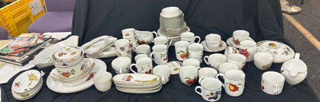 Large selection of Royal Worcester Evesham and Evesham vale pottery to include mugs, plates etc