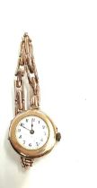 9ct gold cased ladies wristwatch, untested, strap not gold