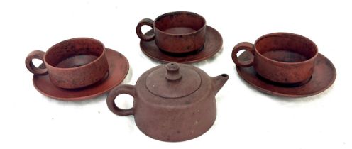 Oriental miniature teapot together with 3 cups and saucers, makers marks to base