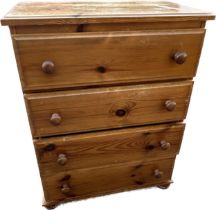 4 drawer pine chest of drawers measures approximately 38 inches tall 29 inches wide 16 inches depth,