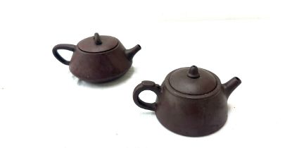 Two Chinese oriental tea pots , marks to base