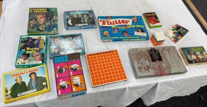 Quantity of vintage board games and jigsaws includes starksy and hutch etc