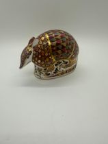 A Royal Crown Derby paperweight, Armadillo, gold stopper, red printed marks and Royal Crown Derby