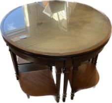 nest of 4 tables, table measures approximately 13 inches tall 29 inches diameter missing 1 glass top