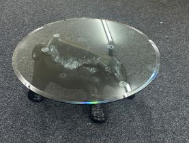 Glass top elephant base coffee table, Height 17 inches, diameter 36 inches