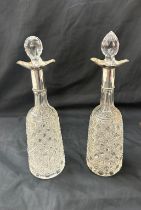 Two silver mounted cut glass decanters Birmingham 1916