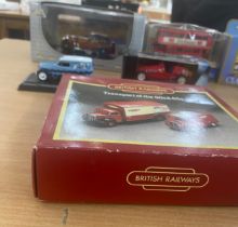 12 boxed die cast cars includes van guards, corgi etc