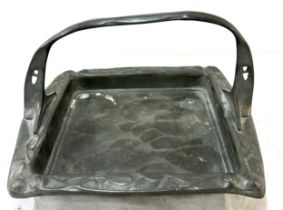 Art Nouveau German pewter square basket tray, circa 1900. with stylised pierced handle and raised