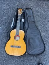 Accoustic guitar in a madarozzo case