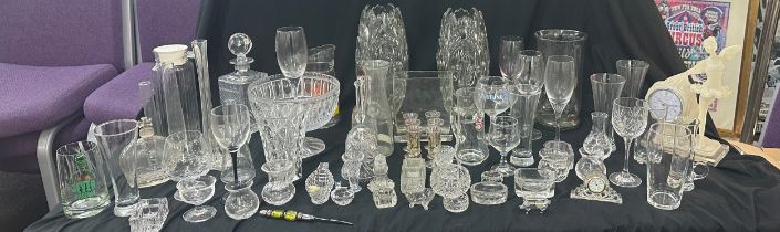 Large selection of glassware to include a pair matching heavy glass vases, decanter, bowls,