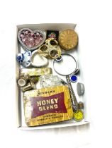 Selection of collectable items includes trinkets, magnifying glass etc