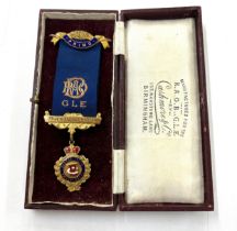 Boxed gold and enamel masonic jewel, justice truth Philanthropy presented to Bro E. Baisden by the