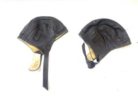 Two chamois lined leather flying hats