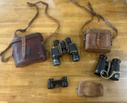 Three pairs of vintage binoculars two possibly WW1 and one other