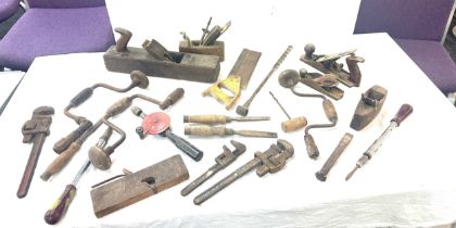 Selection of vintage tools including planes, drills, saws, renches etc