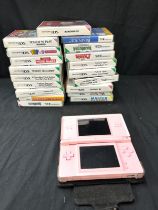 Nintendo DS, no charger, with a selection of games (19 in total), untested