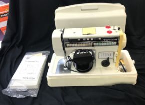 Sewing machine, tayota 701, does twin needle 30 stitches embroidery etc