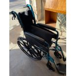 Care co folding wheel chair