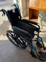 Care co folding wheel chair