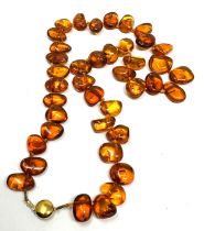 Vintage 9ct gold clasp amber necklace measures approx 52cm long weight 41g