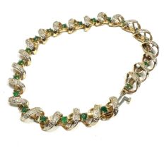 9ct gold diamond & emerald bracelet weight 11.2