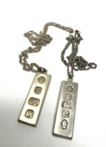 Two silver 1970s ingots and chains (40g)