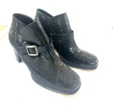 Five pairs of size 8 ladies heeled boots with a buckle