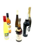 Selection of sealed alcohol to include a magnum of champagne, white bottle of 1933 Toksji aszu etc