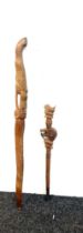 vintage Carved tribal double head stick and 1 other