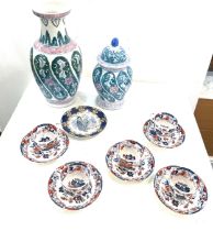 Selection of oriental pottery includes vase, lidded jar etc