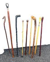 Selection of vintage walking sticks, various handle designs (9 sticks in total)