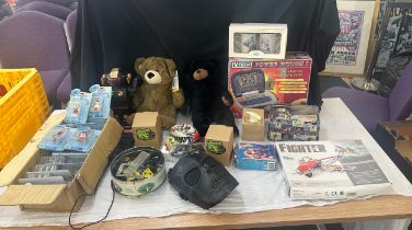 Selection of vintage toys to include Talk a Tron robots, Meccano, Vtech power house