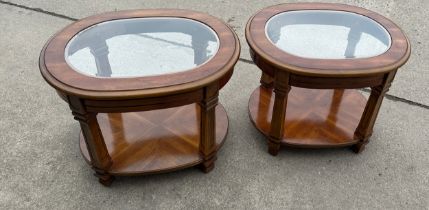 Pair of matching mahogany lamp tables with glass inserts overall height 21.5 inches by 26 inches