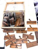 Vintage wooden box containing approx 27 moulding planes