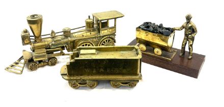 Brass train and tender, miner figure, approximate measurement of train and tender: 20 inches, height