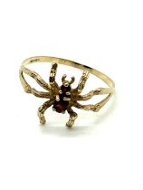 9ct gold garnet and spider ring UK size T. Weight 1.5 grams